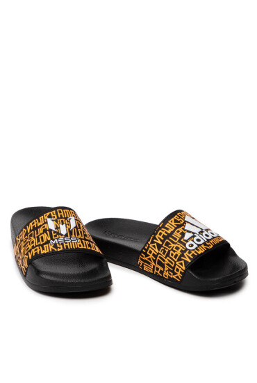 adidas Чехли Adilette Shower Messi K GW6136 Core Black/Cloud White/Semi Solar Gold - Mera.bg