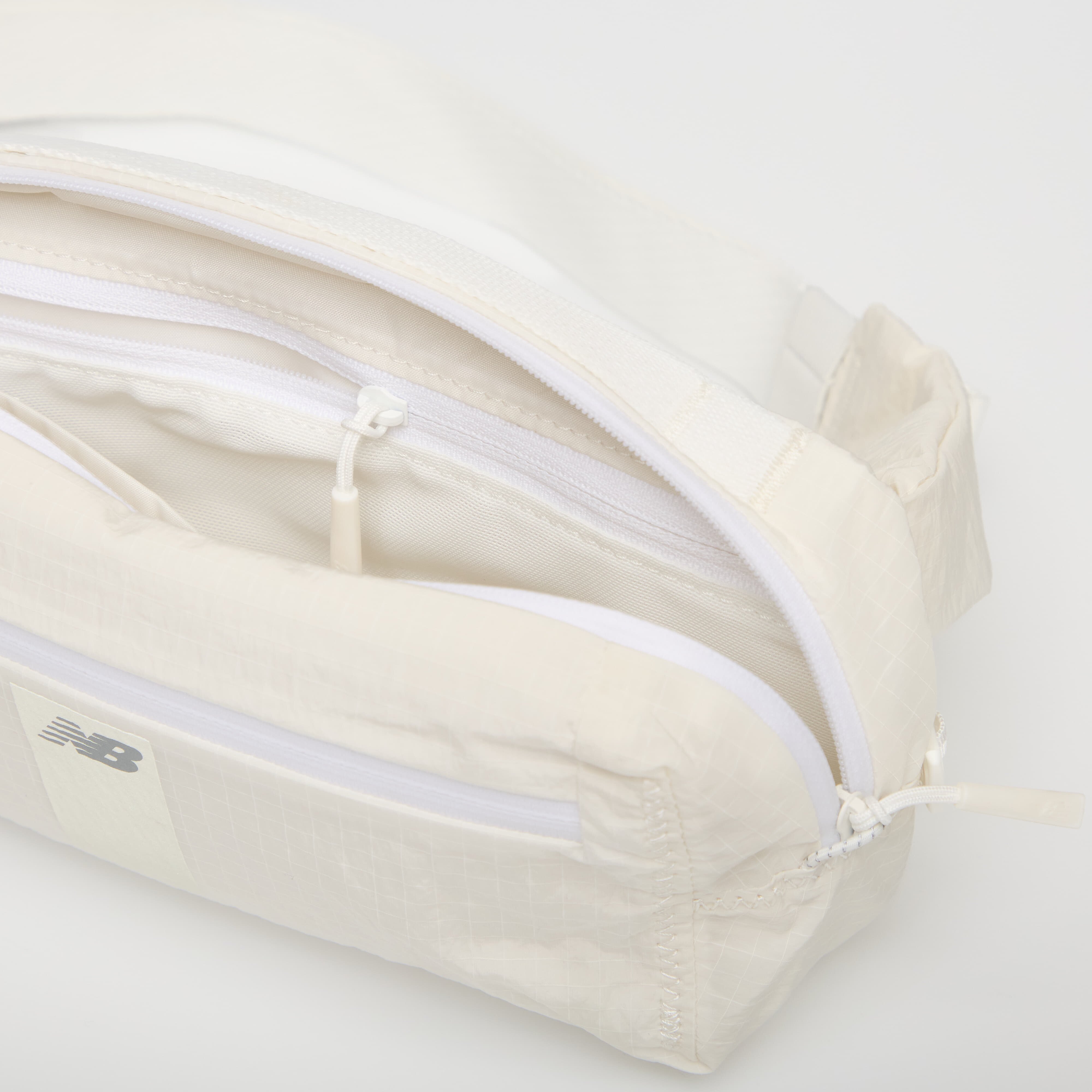 New Balance Чантичка за кръста n Sling Belt Sea Salt